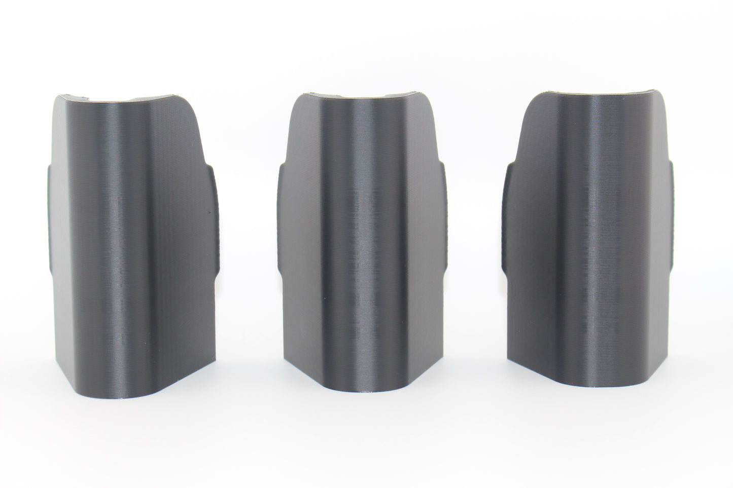 Top surfaces of three SBA5 cheek riser inserts representing 10mm, 17mm and 20mm heights displayed upright on white background