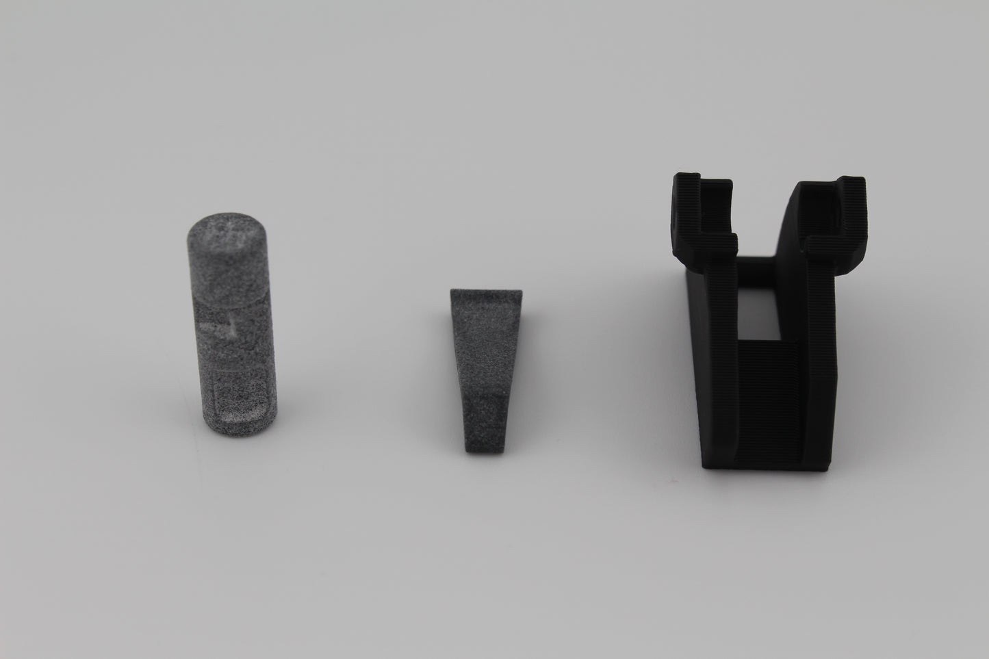 MJF 3D-printed cam, tapered lever and receiver components for Hoffman Tactical 3-position super safety displayed on gray background