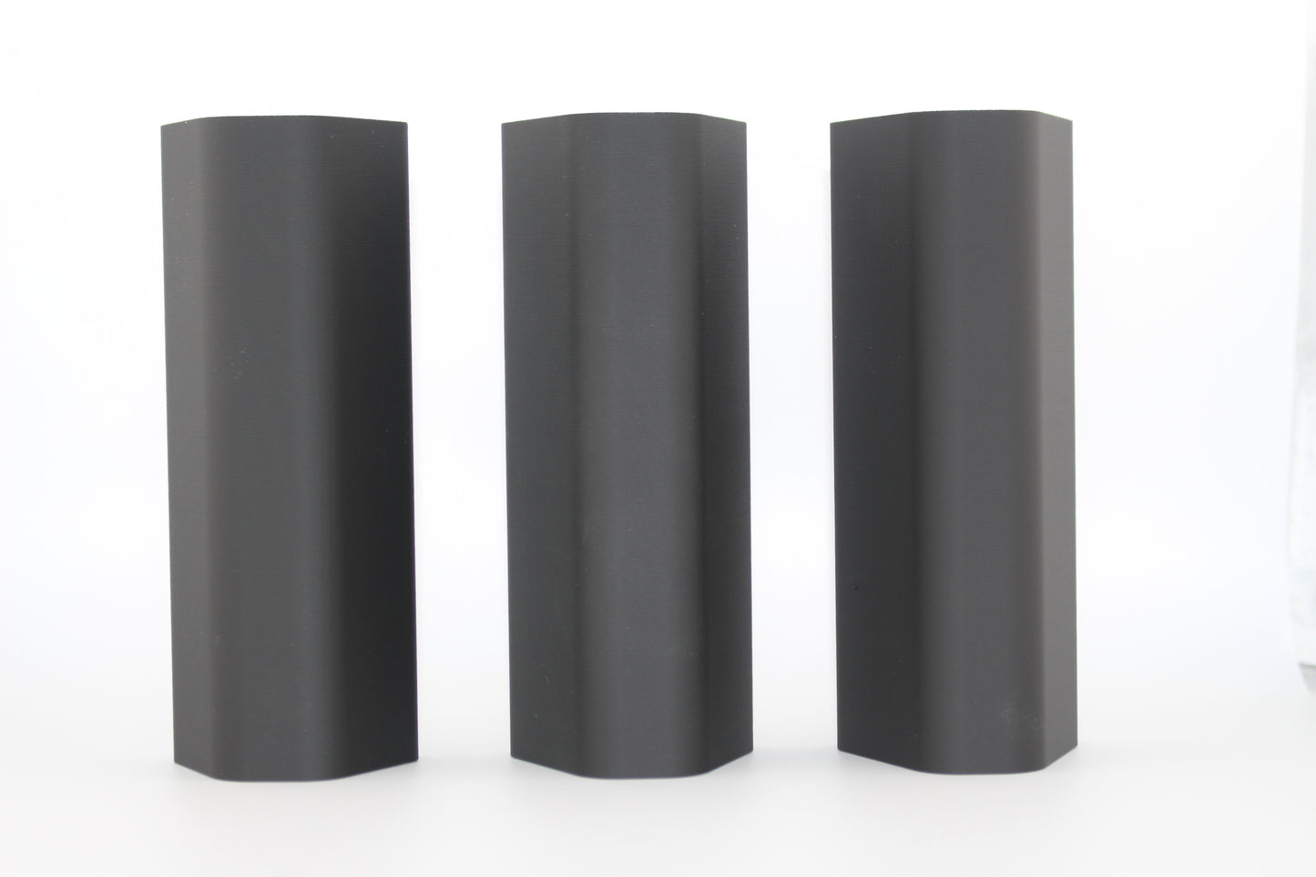 Top surfaces of three full‑size SBA3 cheek riser inserts representing 10mm, 17mm and 20mm heights displayed upright on white background