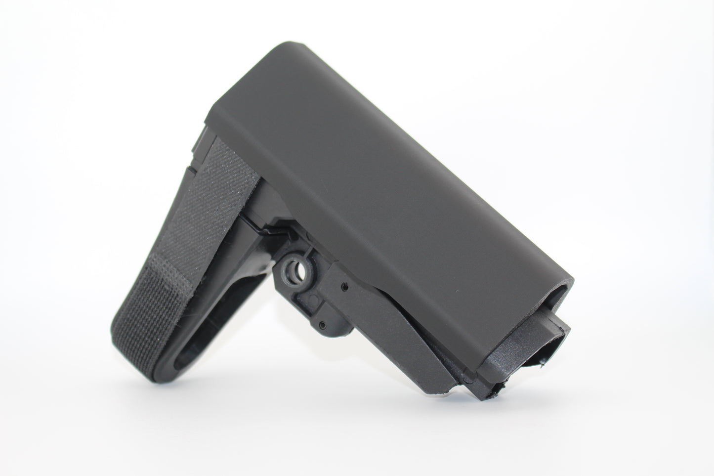 Black polymer full‑size SBA3 cheek riser attachment shown in side view on an SBA3 stabilizing brace on white background