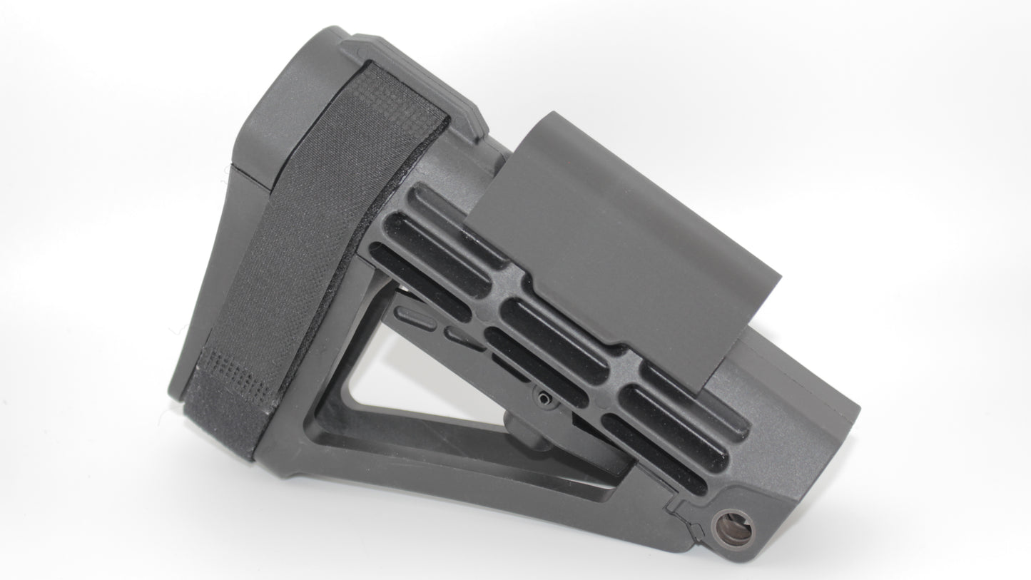 Side view of SBA4 modular cheek riser installed in the middle mounting position on the SBA4 brace, featuring black riser with smooth top and skeletonized brace design, displayed on a light grey background.