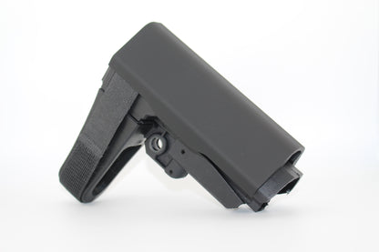 Black polymer full‑size SBA3 cheek riser attachment shown in side view on an SBA3 stabilizing brace on white background