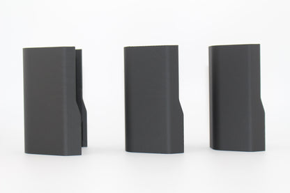 Side view of three black half-size SBA3 cheek riser inserts representing 20mm, 17mm and 10mm heights, aligned upright with contoured outer profiles, displayed on a white background.