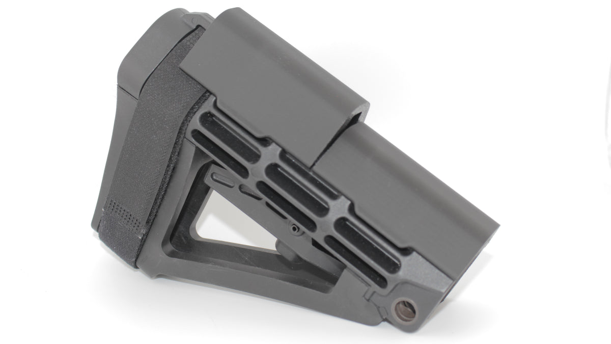 Side view of SBA4 modular cheek riser with dual risers mounted simultaneously on the SBA4 brace, featuring stacked black riser components and skeletonized brace design, displayed on a light grey background.